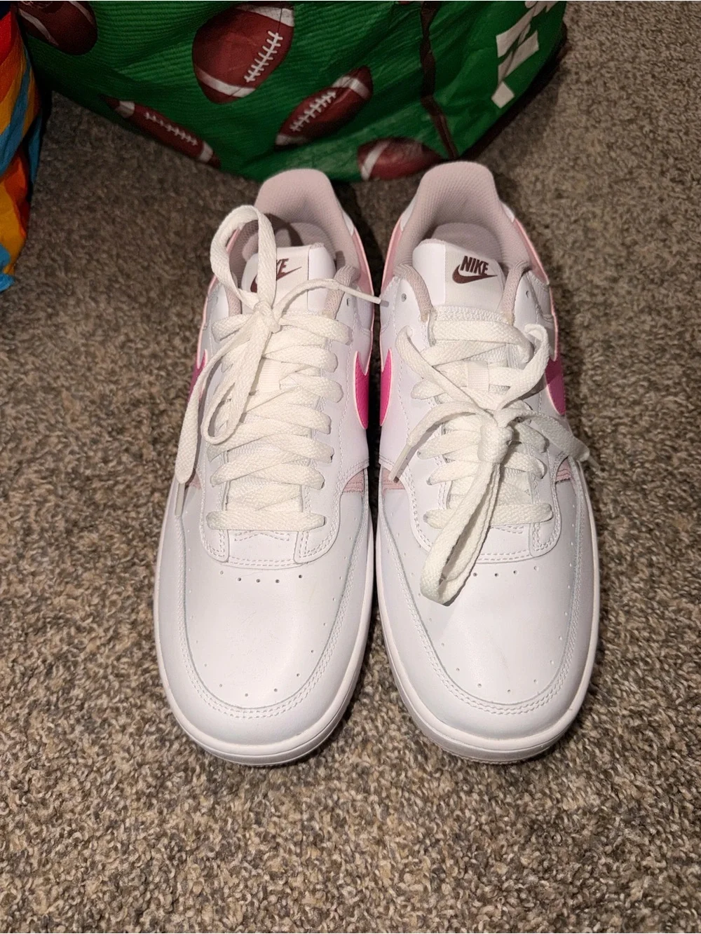Nike Women’s White Sneakers with Pink Swoosh and Pale Pink Accents